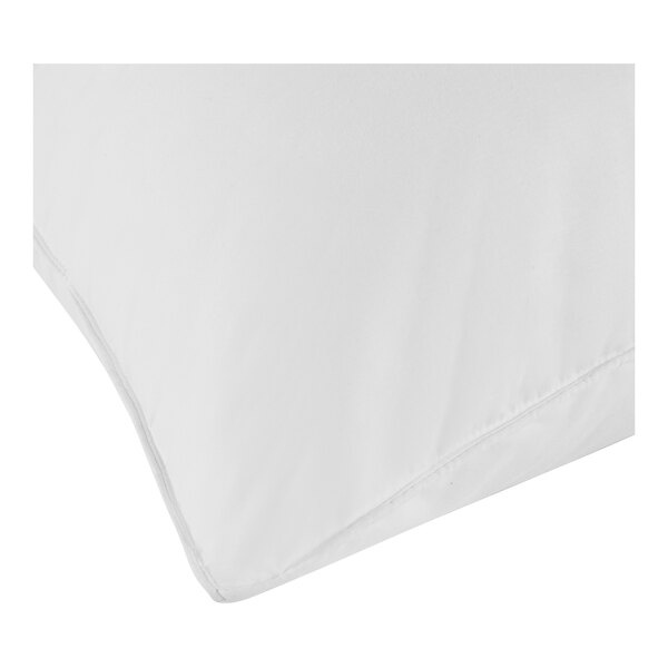 A close-up of a FeatherBest by Pacific Coast Feather white duck feather pillow with a white cloth cover.