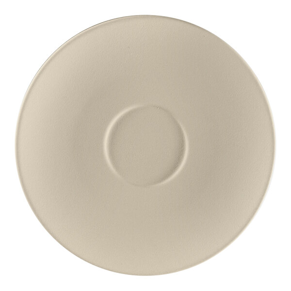 A gray porcelain saucer with a white circle in the center.