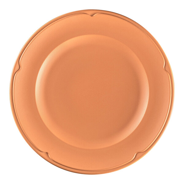 A close-up of a RAK Porcelain Terra Cotta flat plate with a brown rim and white background.
