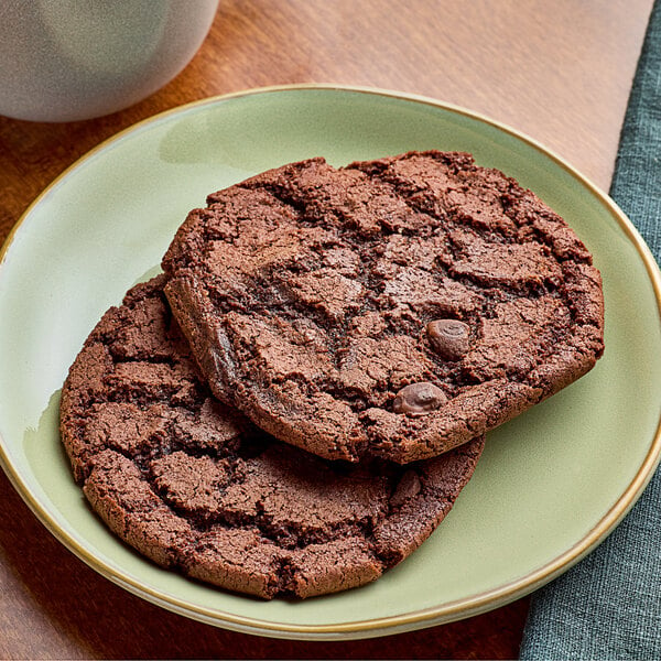 Two Red Plate Foods Individually Wrapped Double Chocolate Cookies on a plate.