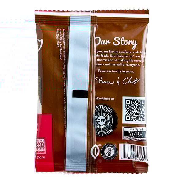 A brown plastic bag with white text and a red label for Red Plate Foods Individually Wrapped Vegan Double Chocolate Cookies.