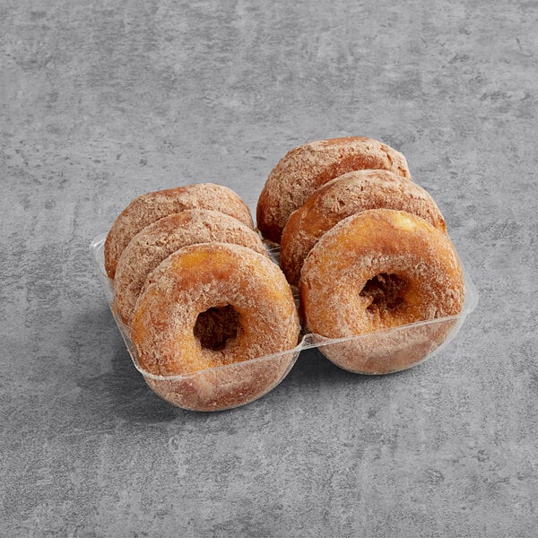 A white tray of Katz Gluten-Free Cinnamon Sugar Donuts.