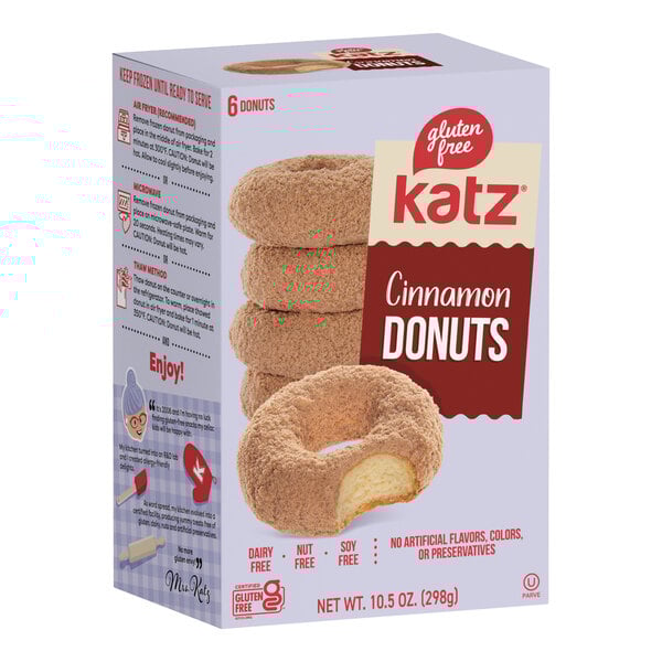 A box of Katz Gluten-Free Cinnamon Sugar Donuts with a stack of donuts on top.
