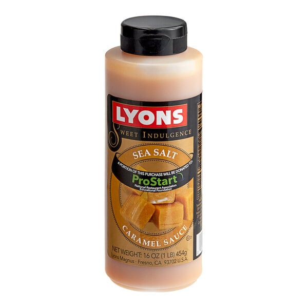 A bottle of Lyons Sea Salt Caramel flavoring sauce on a counter.