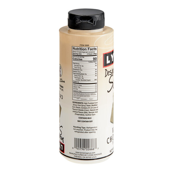 A bottle of Lyons Designer Dessert White Chocolate Flavoring Sauce with a label on it.