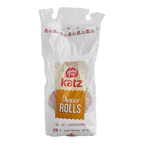 A plastic bag of Katz Gluten-Free dinner rolls on a table.