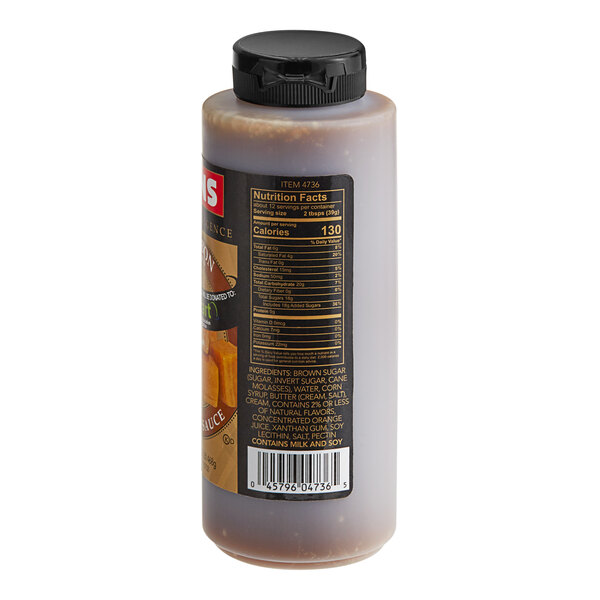 A bottle of Lyons Sweet Indulgence Bourbon Caramel flavoring sauce with a label.