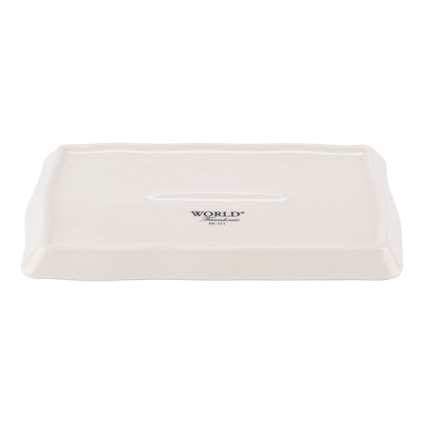 A rectangular cream porcelain tray or platter with slightly raised edges.