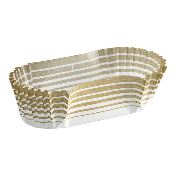 A gold oval paper baking cup with white and gold stripes.