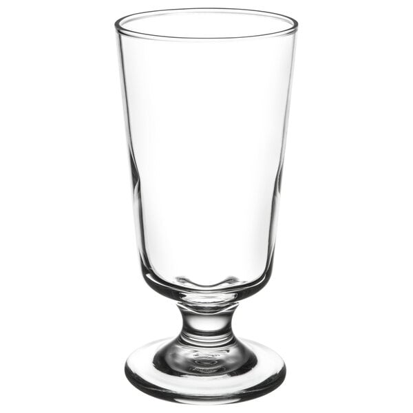 A Libbey footed highball glass with a clear glass and a small base.