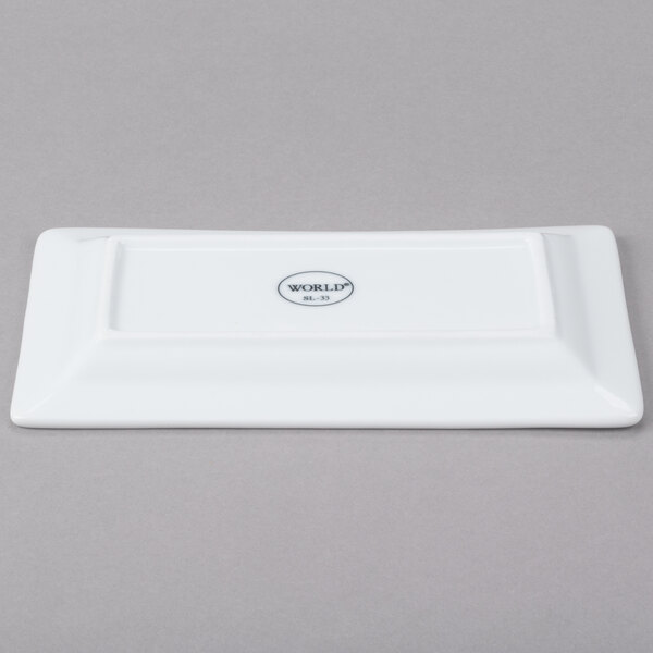 A white rectangular Libbey porcelain plate with a logo on it.