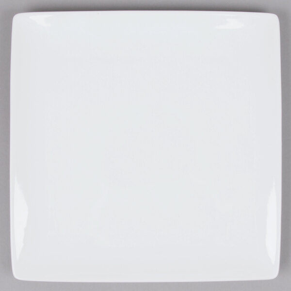 A Libbey white square porcelain plate with a white border.