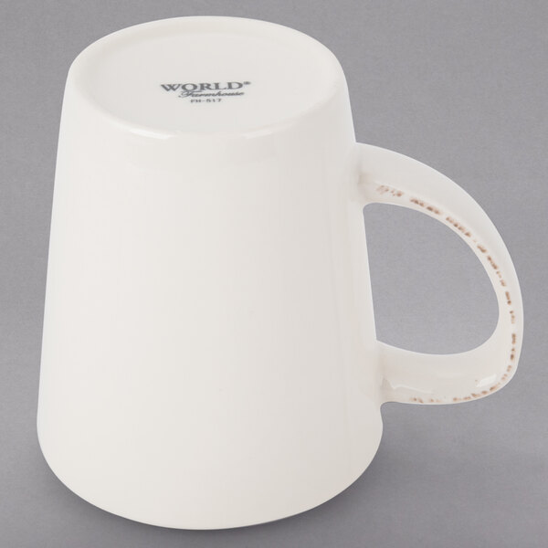 A white Libbey porcelain mug with a handle.