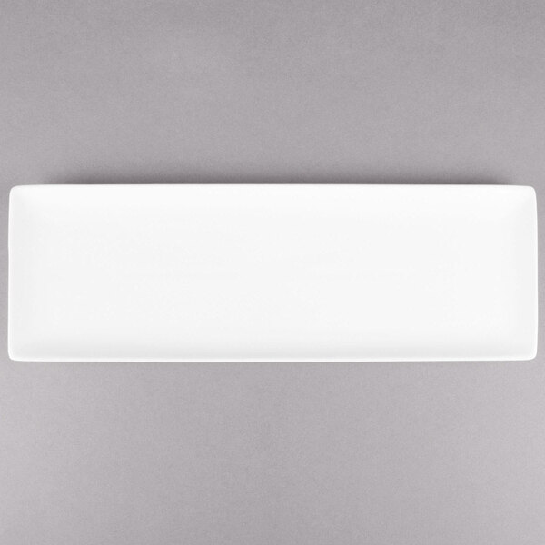 A rectangular white Libbey porcelain tray on a gray background.