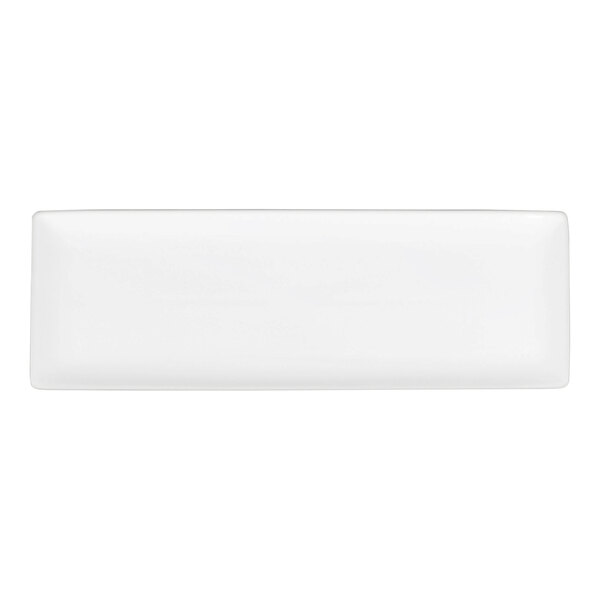 A rectangular, ultra bright white porcelain tray with a coupe design.