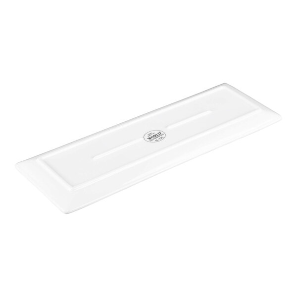 A rectangular, ultra bright white porcelain tray with a coupe design.