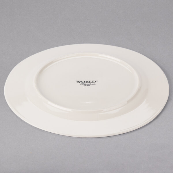 A white Libbey porcelain plate with a medium rim.