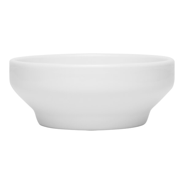 A Libbey white porcelain grapefruit bowl.