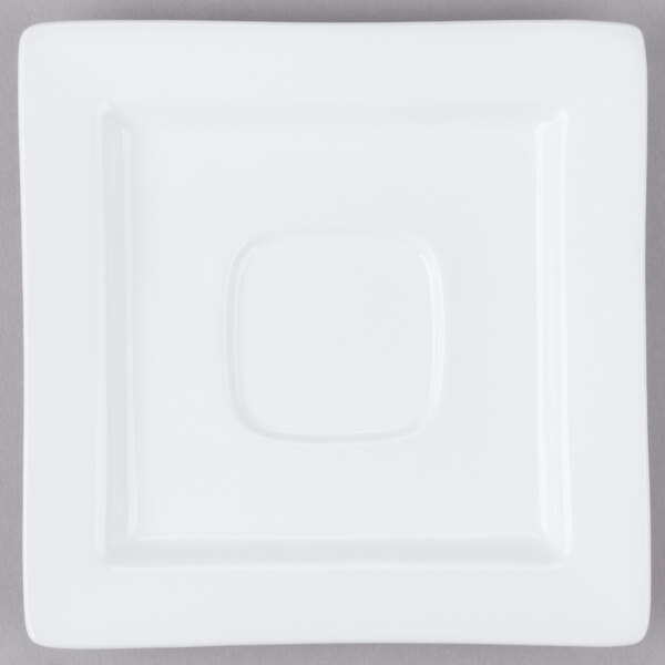 A white square Libbey porcelain saucer with a square center.