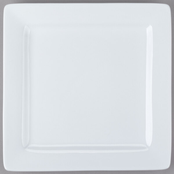 A white square Libbey porcelain plate with a square rim.