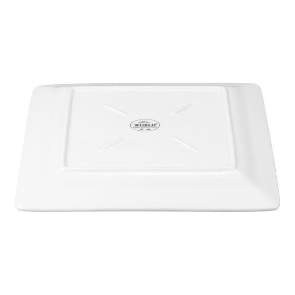 A white square porcelain plate with a wide rim and a central logo on the bottom.