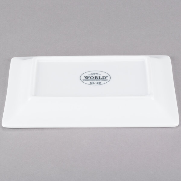 A close-up of a white rectangular Libbey porcelain plate.