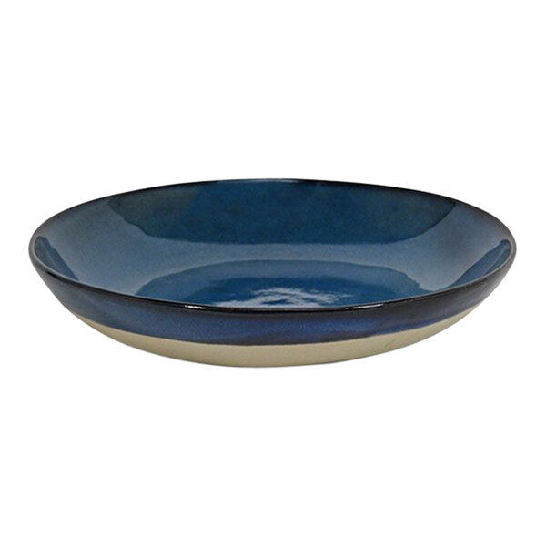 A blue bowl with a white rim.
