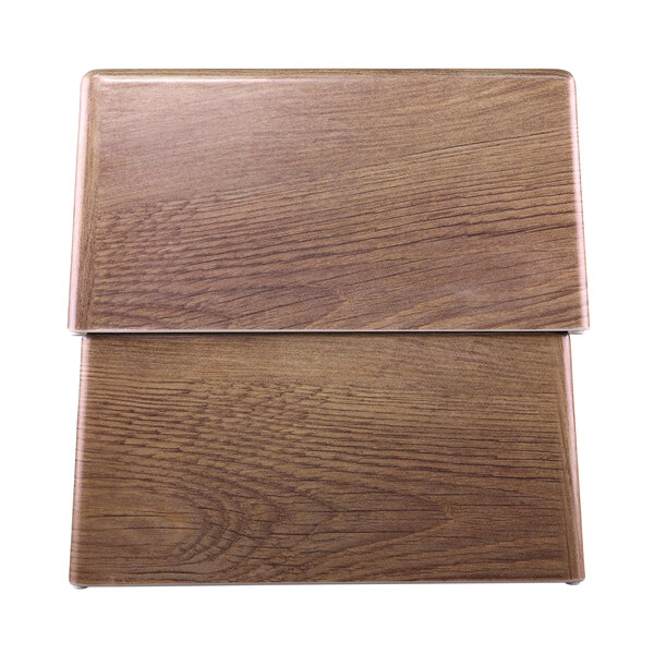 A rectangular faux walnut melamine riser with a wood grained surface.
