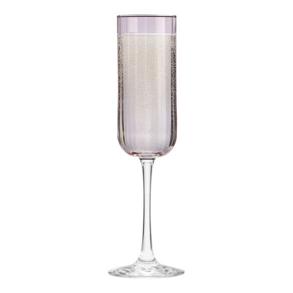 A Libbey pink flute glass with a purple rim.