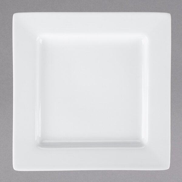 A Libbey Ultra Bright White square porcelain plate with a wide white rim.
