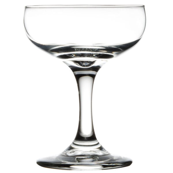 A clear Libbey Embassy coupe glass with a stem.
