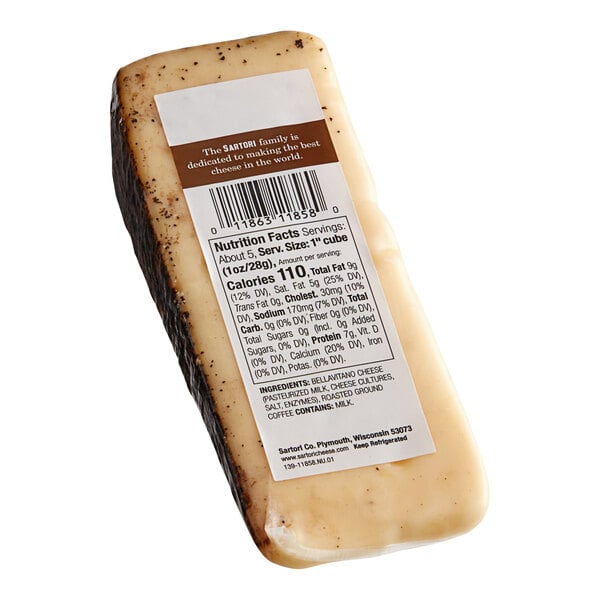 A Sartori Espresso BellaVitano cheese wedge with a label.