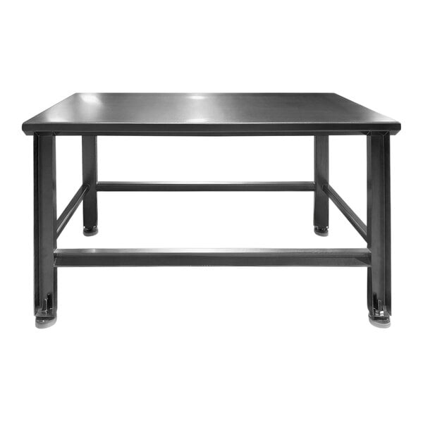 A stainless steel work table with black adjustable foot pads.