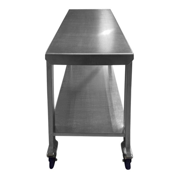 A stainless steel SSL Industries work table with casters.