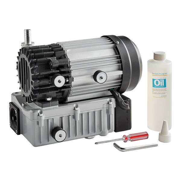 A VacPak-It electric pump in a grey box with a bottle of oil.