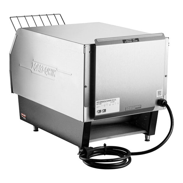 A large metal Hatco conveyor toaster with a cord.