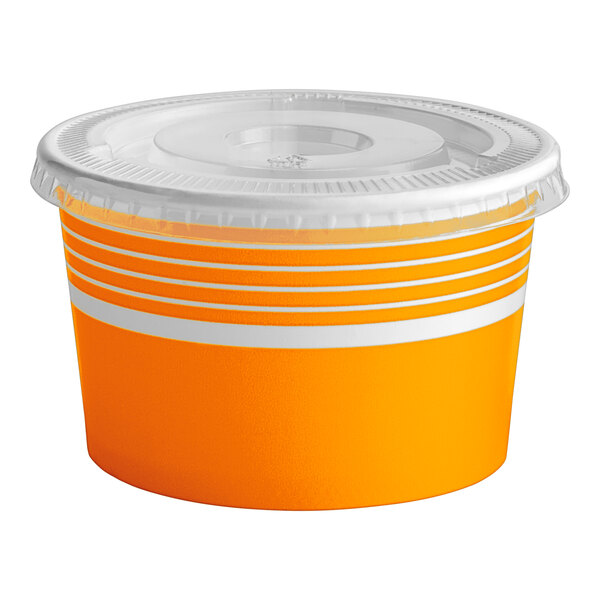 An orange paper Choice frozen yogurt cup with a white lid.