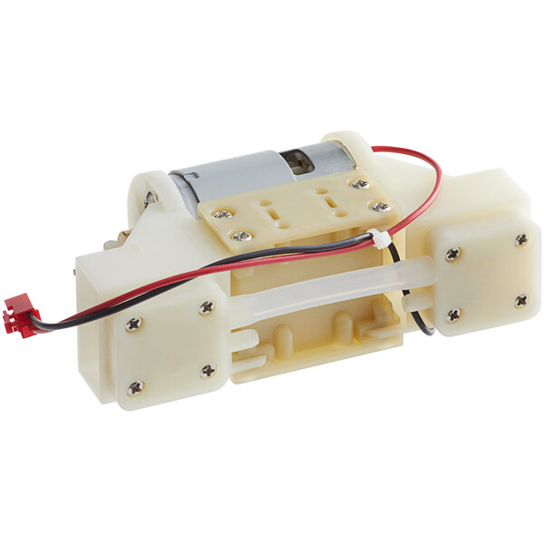 A white and black VacPak-It Ultima pump with wires.