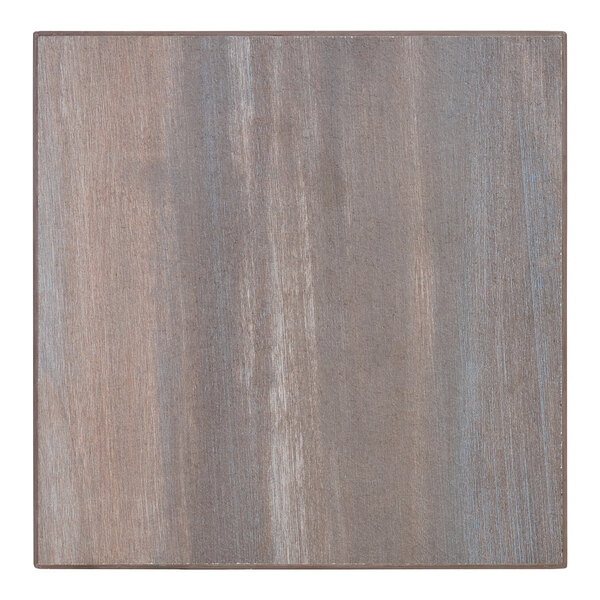 A close up of a chestnut wood square table top with matching edge.