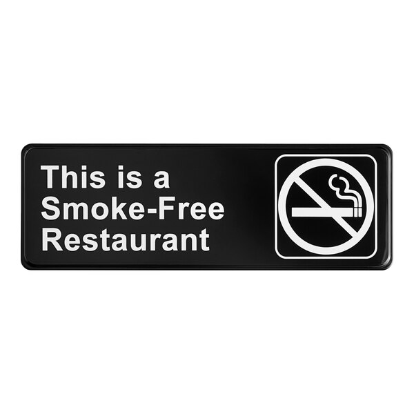 A black Lavex smoke-free restaurant sign with white text.