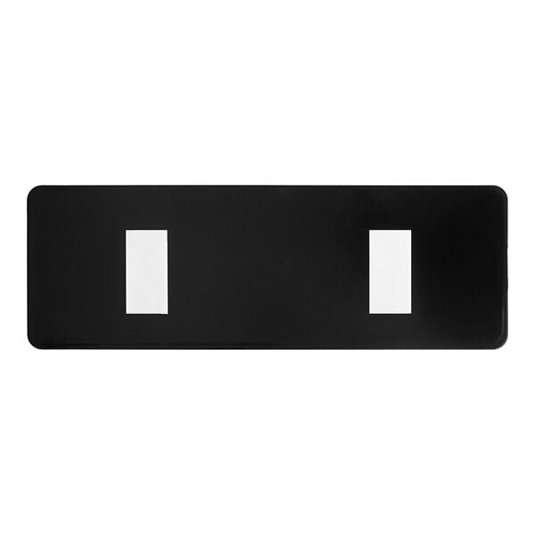 A black rectangular sign with white rectangles and black border with white text that reads "This Is A Smoke-Free Restaurant" and two holes.