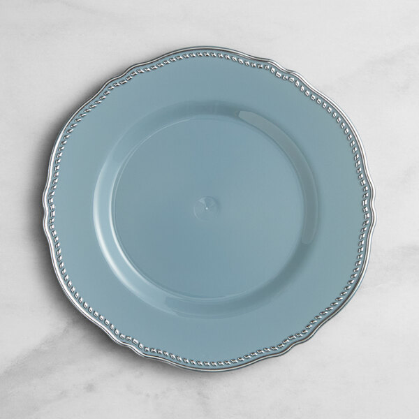 A Visions steel blue plastic plate with a silver vintage rim.
