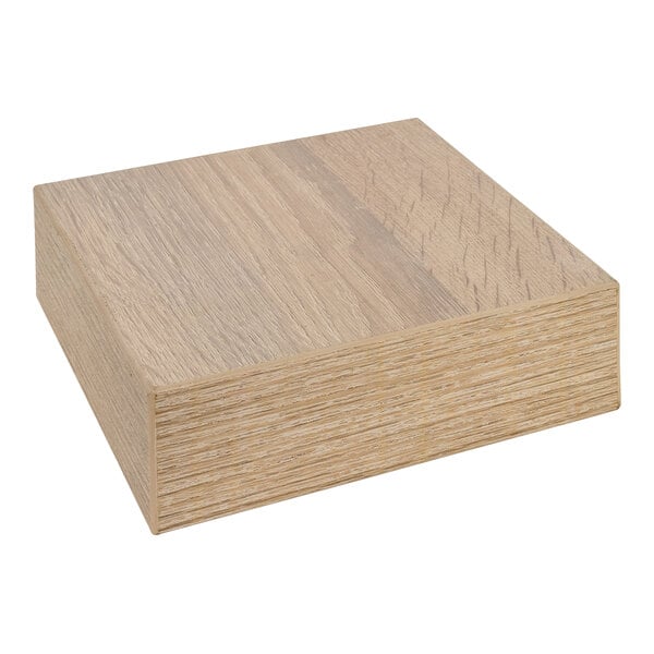 A BFM Seating Sawmill Oak laminate square sample on a white background.