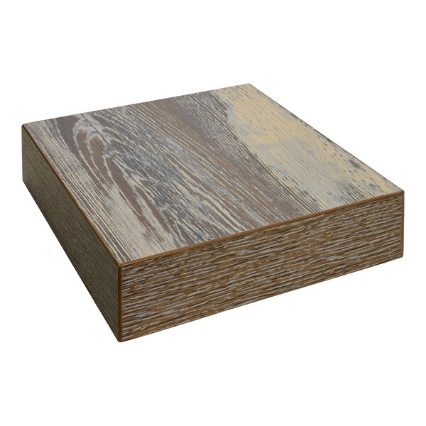 A BFM Seating Relic square melamine table top sample with a brown and white finish on a wooden box.