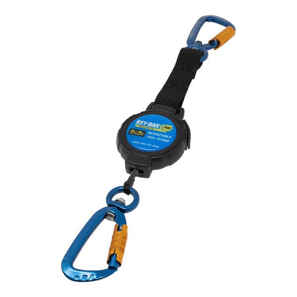 A blue and black KEY-BAK Pro ToolMate carabiner with yellow and blue text.