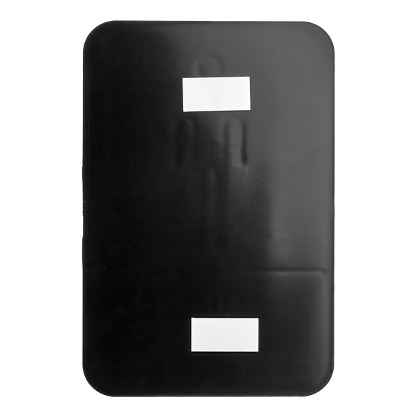 A white rectangular object with black border and white labels that reads "Men's Restroom" in English and Braille.