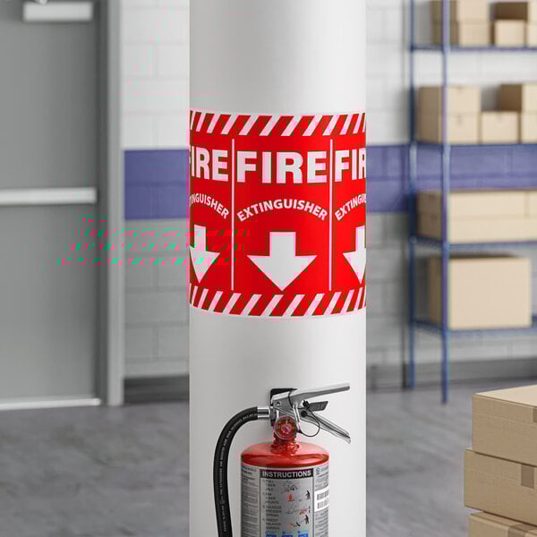 A red and white Lavex safety label for a fire extinguisher with a down arrow.
