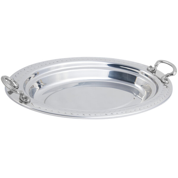 A stainless steel oval food pan with round stainless steel handles.