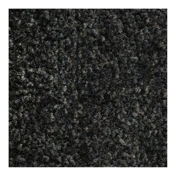 A close up of a M+A Matting Cabot Gray carpet with black rubber border.
