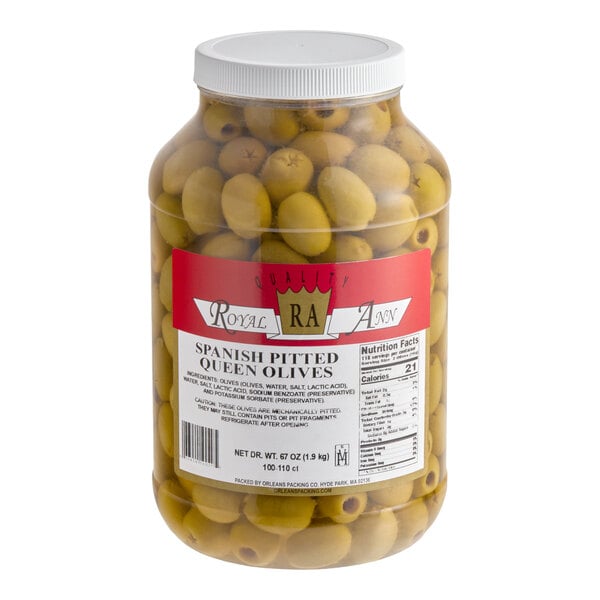 A large plastic jar of Spanish pitted queen olives labeled 'Royal Ann' with a net drained weight of 67 ounces.